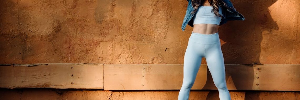 Fitness model in light and shadow, California